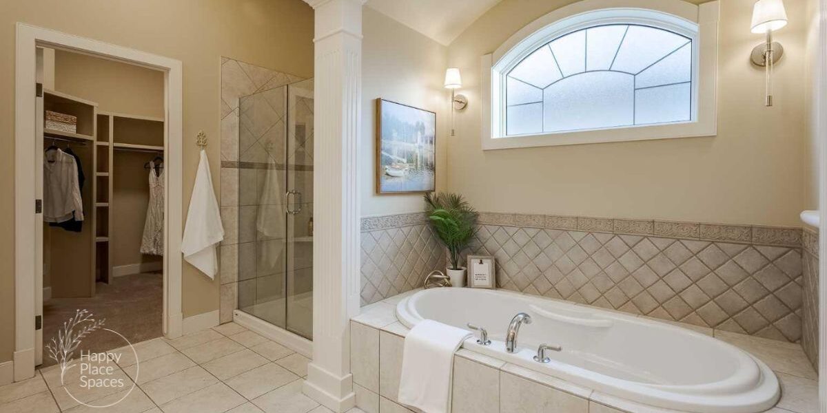 Staged bathroom with neutral décor, fresh white towels, and minimal accessories creating a clean, move-in-ready look.